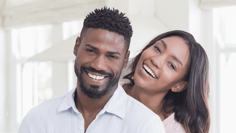 married man and woman smiling