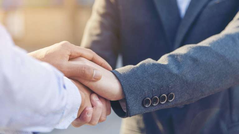 two people holding hands in schaumburg 