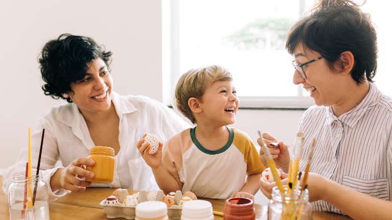 two moms painting with their son in schaumburg