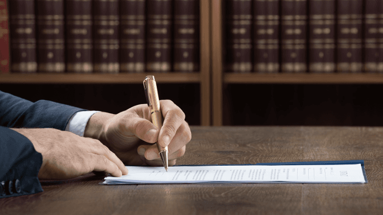 lawyer filling out divorce paperwork in schaumburg