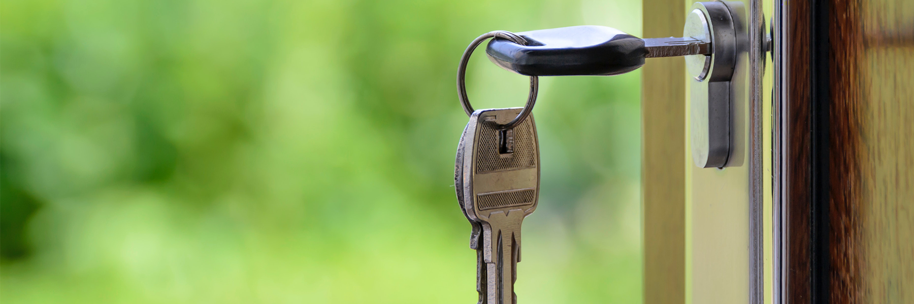 Close up of keys in lock on door in schaumburg